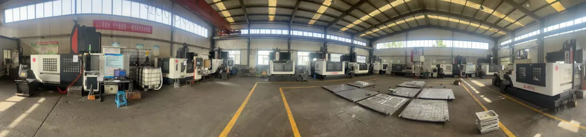 Panorama of the CNC hall with machining centres along both sides